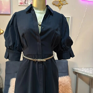 Chic navy dress, perfect for any occasion. Stylish!